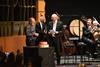 Great British Bake Off 2021 Semi-Finalist Jürgen presents London Philharmonic Orchestra with a 90th birthday cake