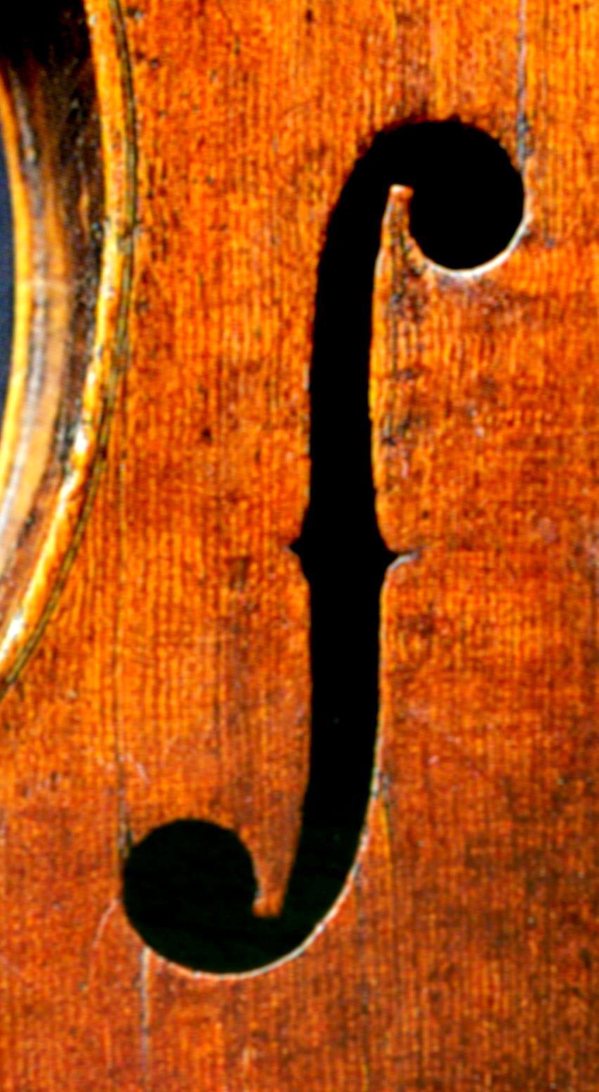 Tracing the development of violin f-hole design through peeling an