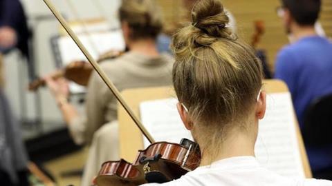 Musicians of the North German Youth Philharmonic Orchestra in rehearsal