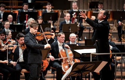 Amihai Grosz is part soloist, part Berlin Phil colleague in a new viola concerto. Photo: Lena Laine