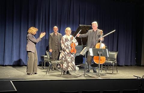 Composer Victoria Bond applauds the Rudersdal Chamber Players at their American debut. Photo: Gail Wein