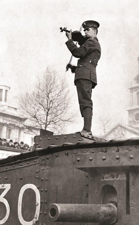 Albert Sammons playing his violin on top of a tank in London’s Trafalgar Square, c.1916, for a publicity photograph designed to bring in recruits