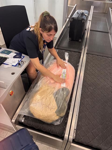 Case checked in with bows