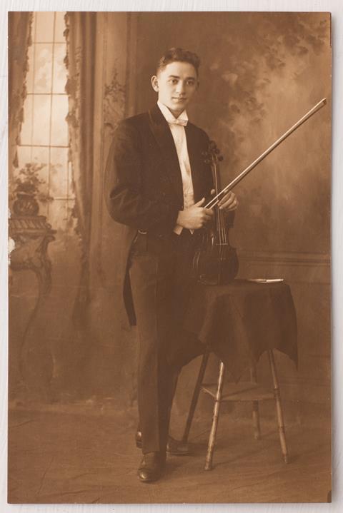 A young Alex Drasein with his violin