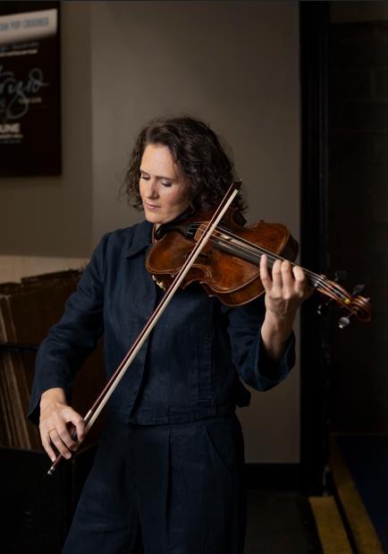 Stefanie Farrands playing the Maggini viola. Photo: Charlie Kinross