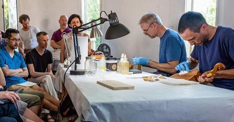 Jeff Phillips and Antoine Nédélec give an antiquing demonstration at the Oberlin Violin Makers Workshop