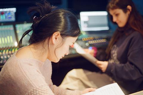Ting-Ru Lai with Ellie Consta listening to recording