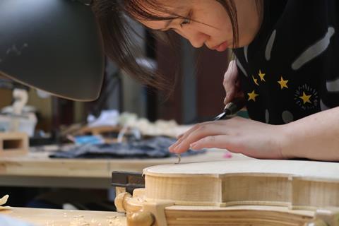 Xinghai - first-year student working on violin