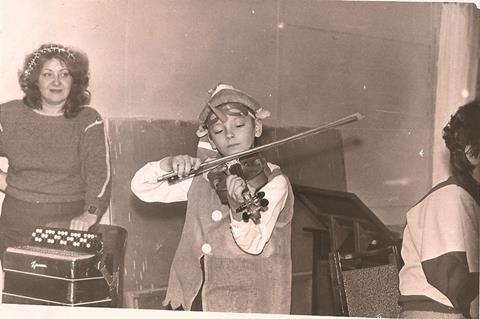 Maxim Rysanov aged six, dressed as Pinocchio