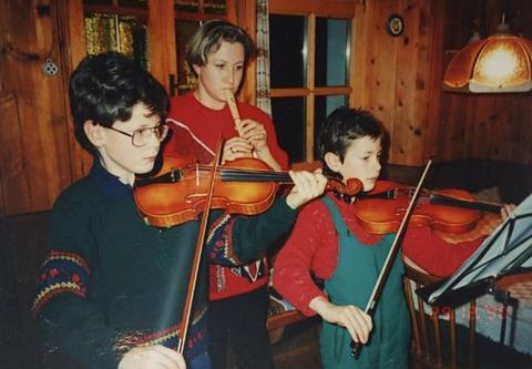 me and one of my brothers and my mum playing chamber music at christmas (I was 10)