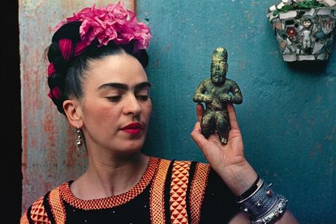 Frida Kahlo with Olmec figurine, 1939. Photograph Nickolas Muray. © Nickolas Muray Photo Archives